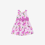 Pink dress with cherry pattern on a white background