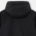 Close-up back view of a black hooded puffer jacket against a light gray background.