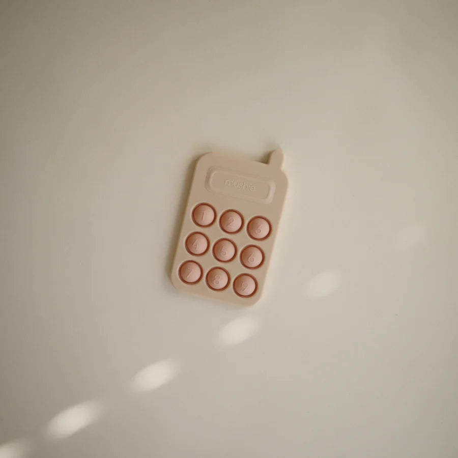 Mushie Phone Press Toy Blush | Casa Childrenswear