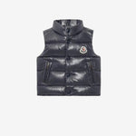 Black puffer vest with brand logo on a white background