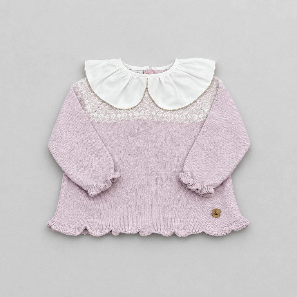 A baby long-sleeve knit top in dusty pink corduroy with a contrasting white ruffled Peter Pan collar and lace trim at the chest, displayed flat on a neutral gray background.