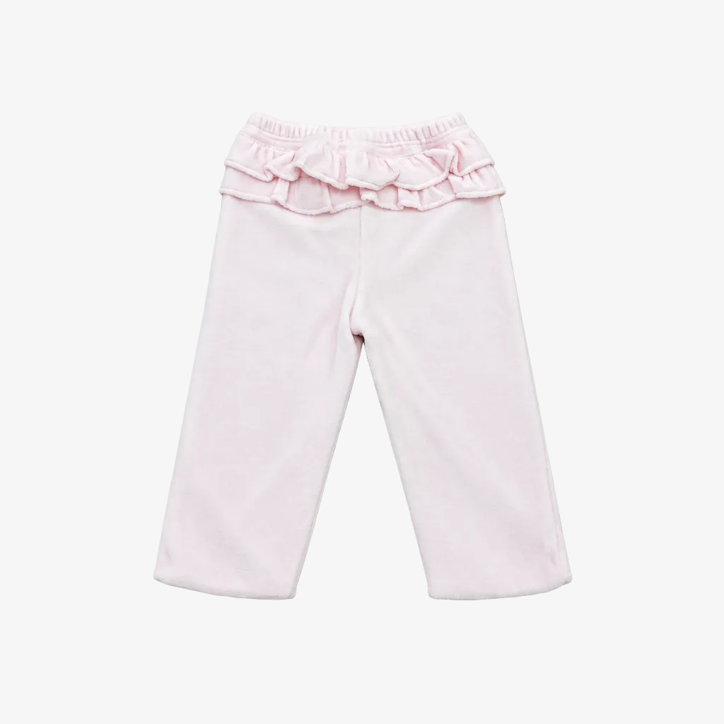 Light pink toddler pants with a ruffled elastic waistband, laid flat on a neutral gray background.