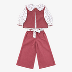 A toddler girl's two-piece clothing set featuring dusty rose corduroy pants and a matching vest over a white long-sleeve blouse with a small floral print and a Peter Pan collar, laid flat on a neutral gray background.