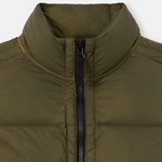 Close-up of an olive green puffer jacket with a high stand-up collar and a black front zipper, shown against a light gray background.