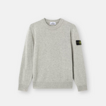 A light gray heather crewneck sweater with the iconic Stone Island compass patch on the left sleeve, displayed on a clean white background.