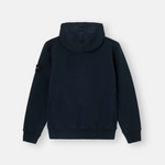 A dark navy blue hooded sweatshirt shown from the back, featuring a small black brand patch on the left sleeve, set against a plain light gray background.