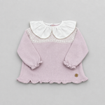 A baby long-sleeve knit top in dusty pink corduroy with a contrasting white ruffled Peter Pan collar and lace trim at the chest, displayed flat on a neutral gray background.
