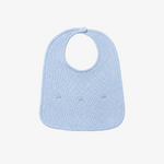A light blue textured fabric baby bib with a small snap button at the top, shown on a neutral light gray background.