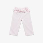 Light pink toddler pants with a ruffled elastic waistband, laid flat on a neutral gray background.