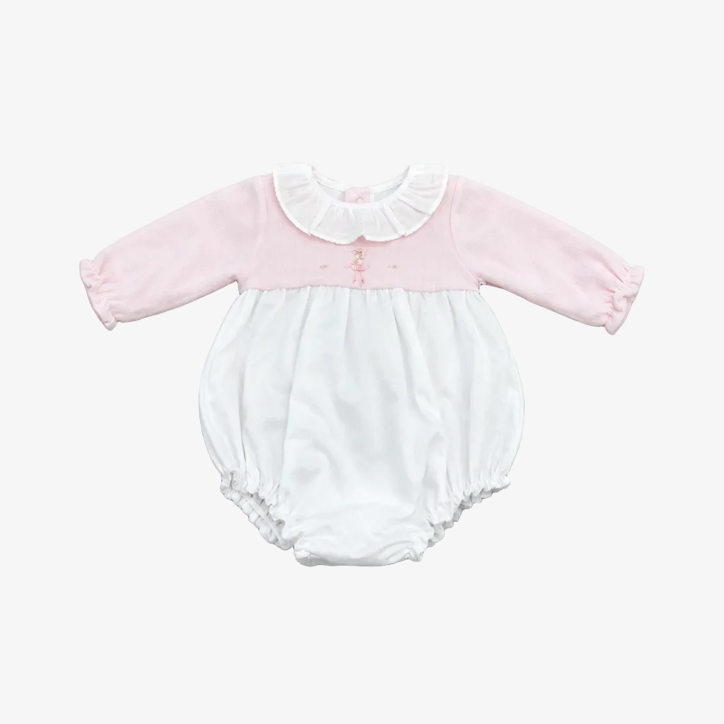 A baby long-sleeve romper in light pink and white, featuring a ruffled Peter Pan collar, three small pink buttons on the chest, and elasticated leg openings, laid flat on a neutral gray background.