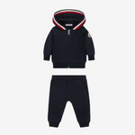 Navy blue children's hoodie and pants set with red and white accents on a white background