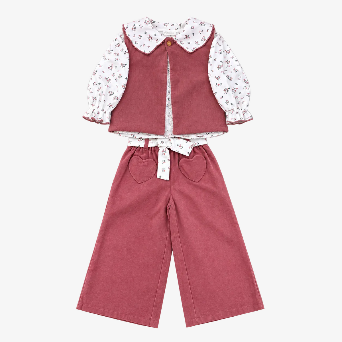 A toddler girl's two-piece clothing set featuring dusty rose corduroy pants and a matching vest over a white long-sleeve blouse with a small floral print and a Peter Pan collar, laid flat on a neutral gray background.