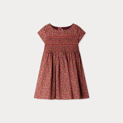 Red floral dress on a white background