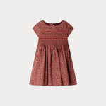 Red floral dress on a white background