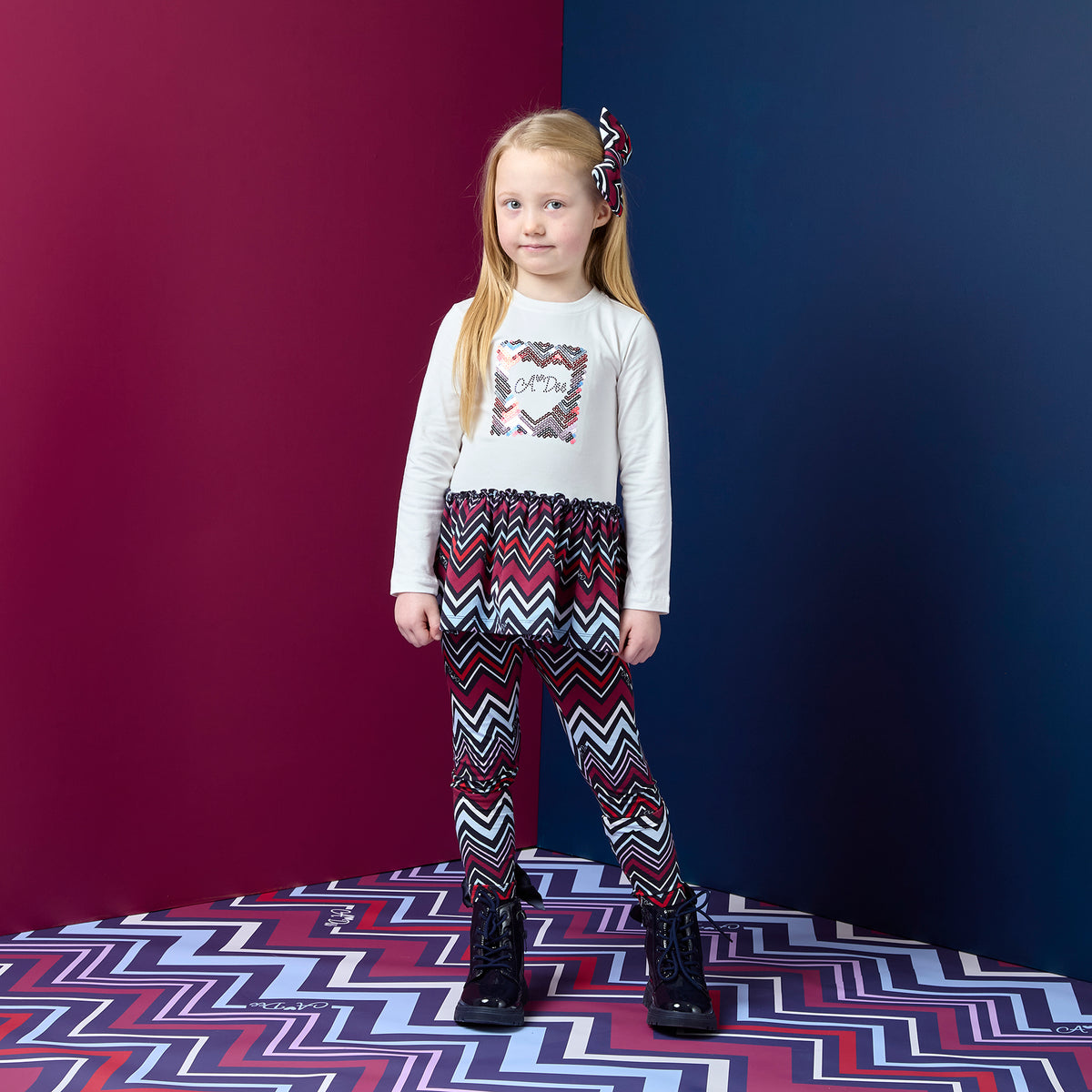A Dee Crissy Navy Chevron Print Peplum Legging Set | Casa Childrenswear